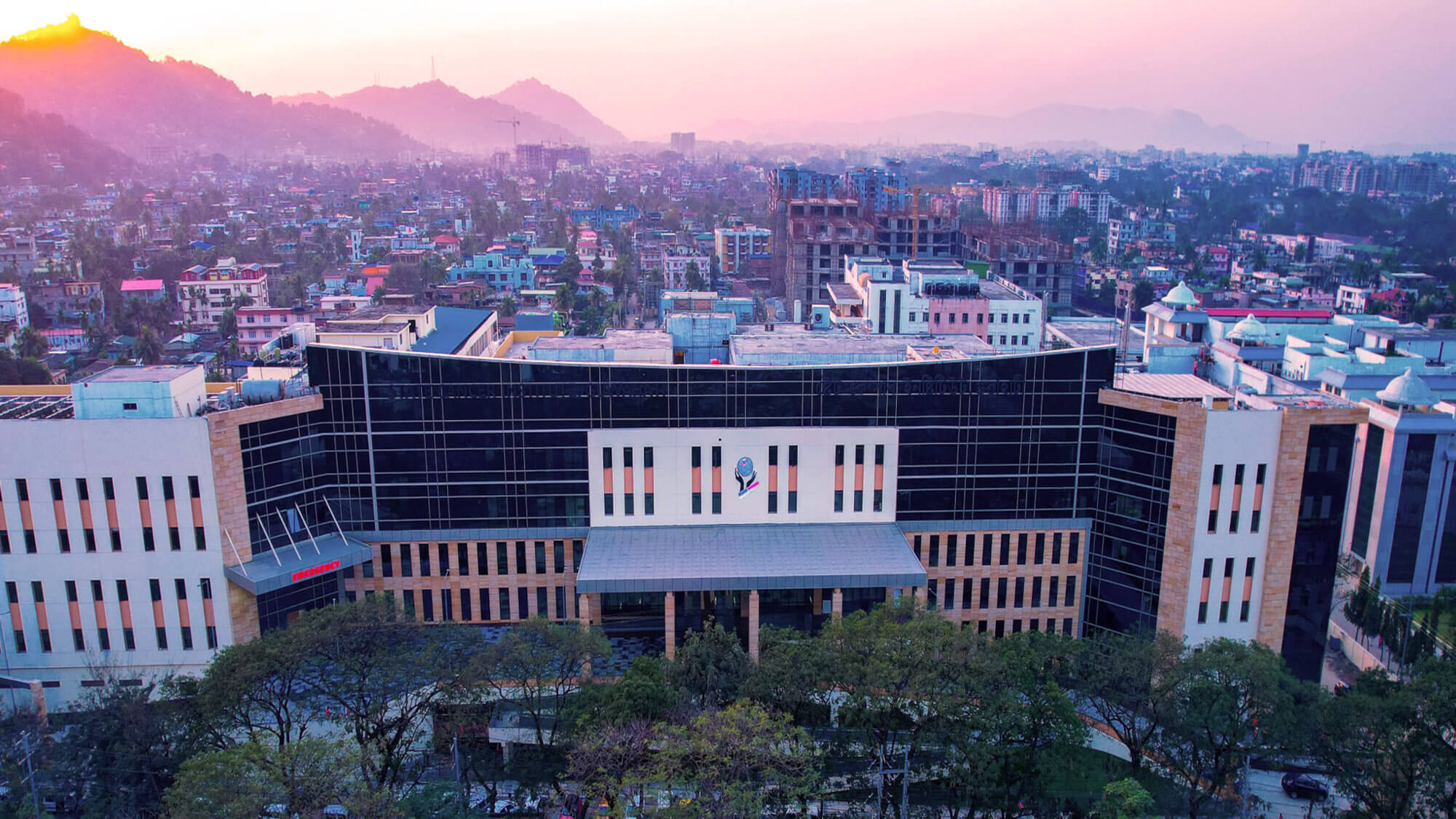 Hospital building in the middle of a city.