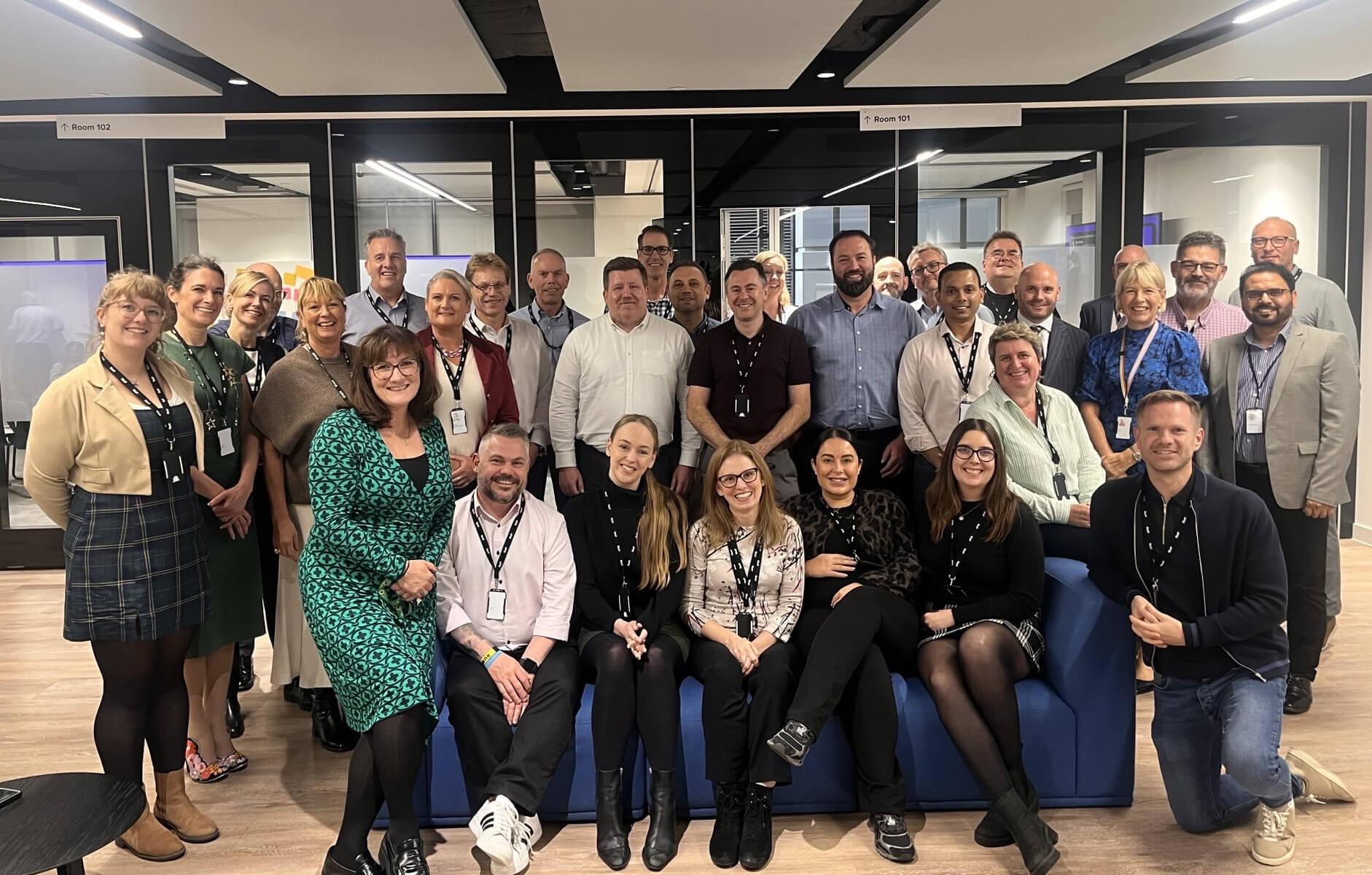 Team photo of Mott MacDonald staff in an office.