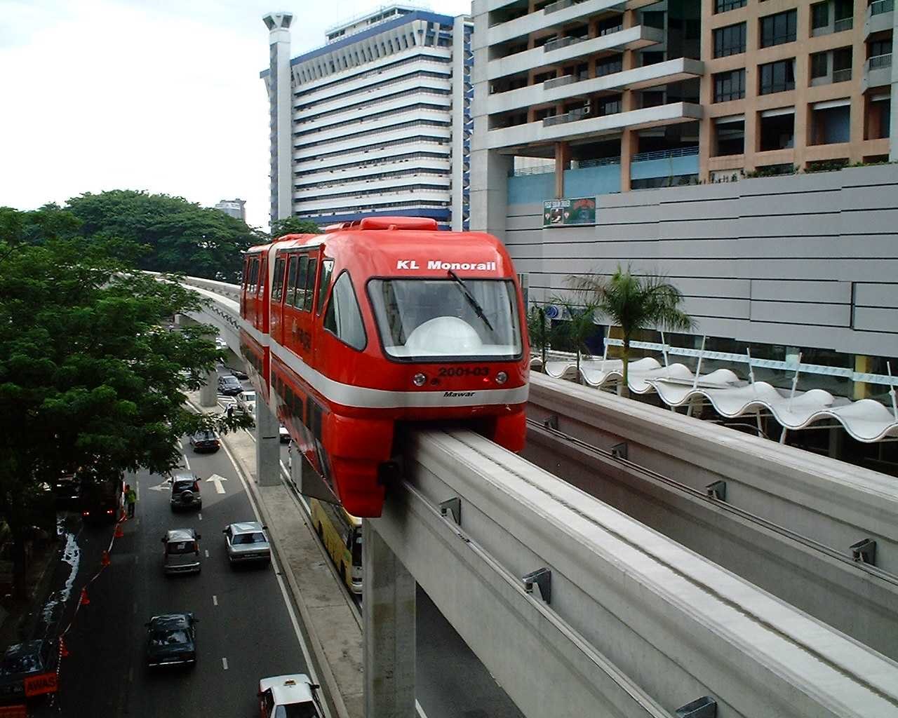 A red KL monorail train in Kuala Lumpur.