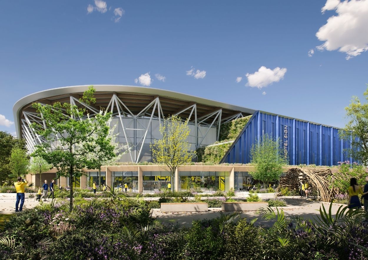 Visual rendering of Oxford United FC's future stadium featuring the North Stand and integrated club shop from the northeast, part of the 2023 development led by Mott MacDonald
