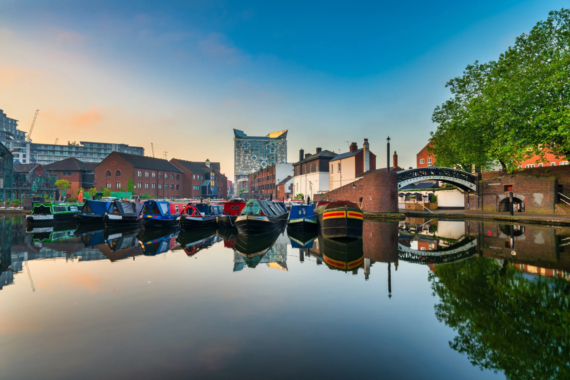 Canal boats on water.