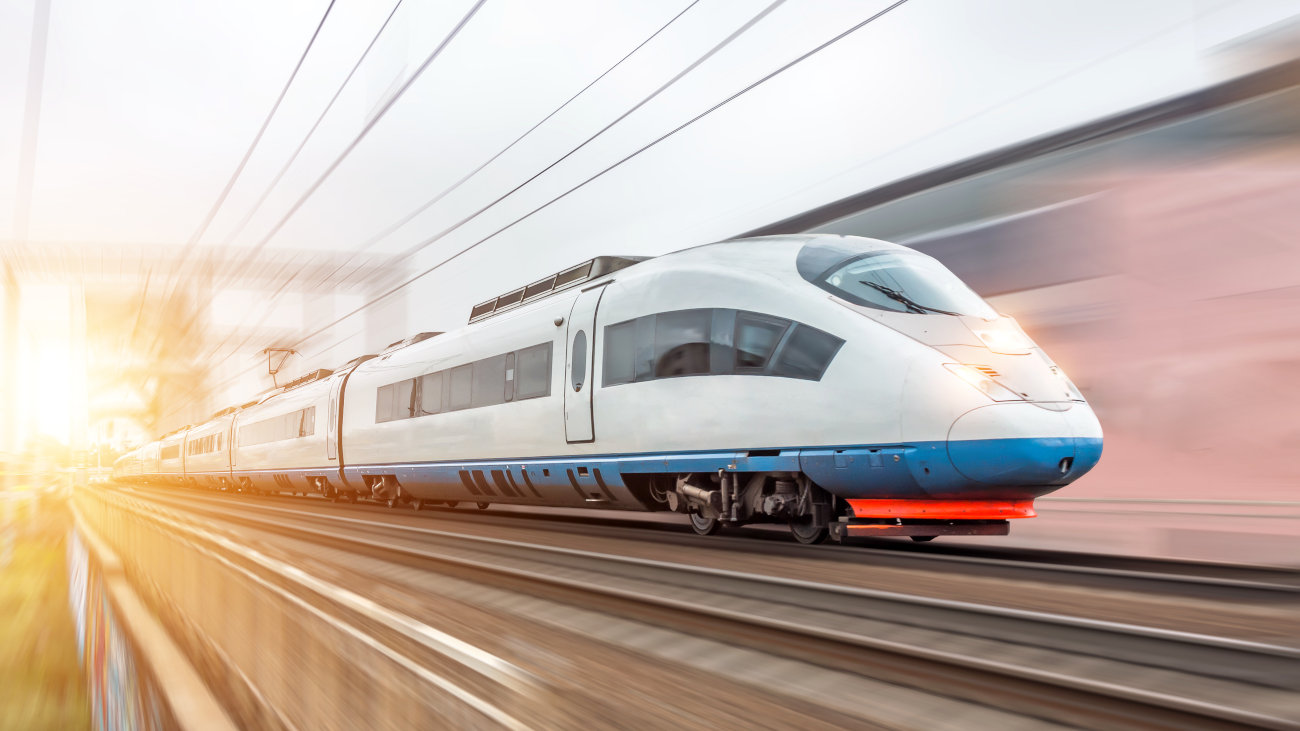 High speed fast train passenger locomotive in motion at the railway station city_1189478818.jpg