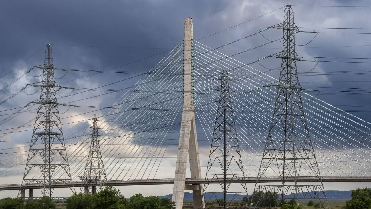 Bridge and power lines running through the countryside