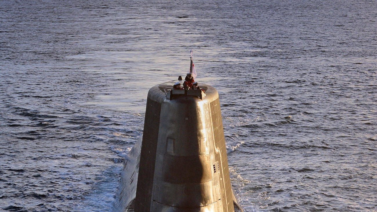 Naval officers on a submarine.