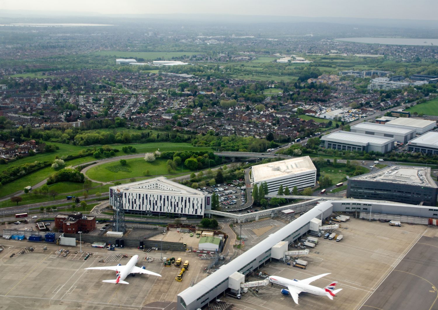 An aerial view of two British Airways jets at Heathrow airport
