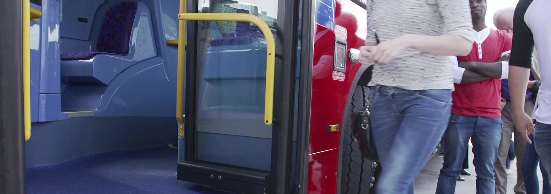 Passengers boarding a bus.