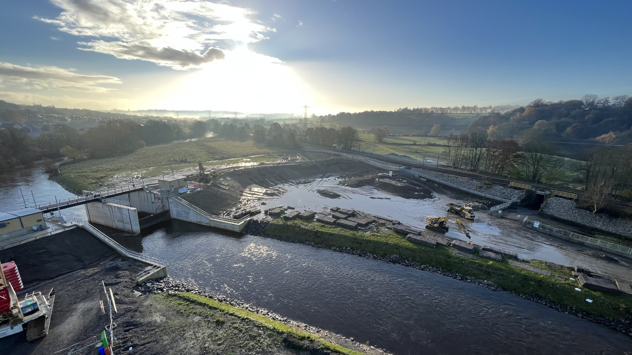 Engineering works by a river.