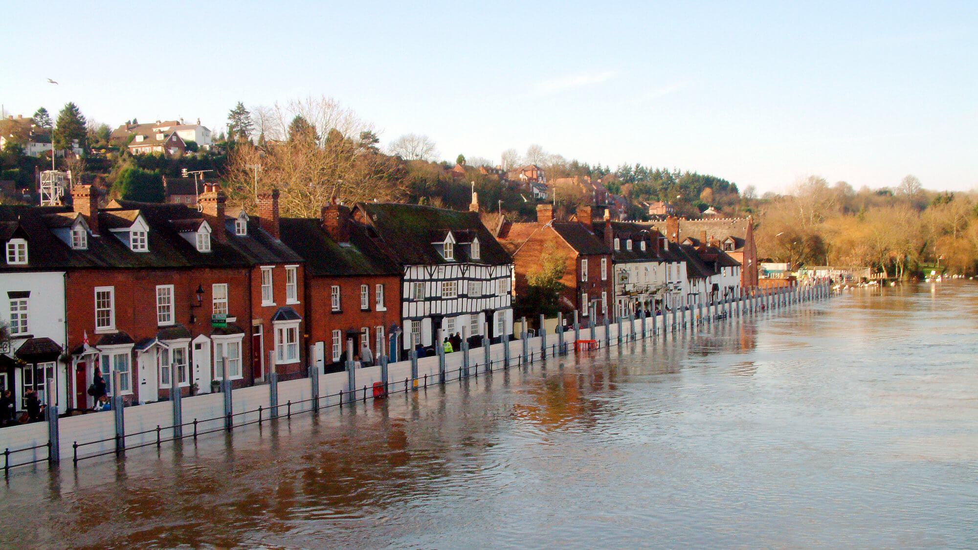 Flood defences protecting houses from high water levels in Bewdley, UK.