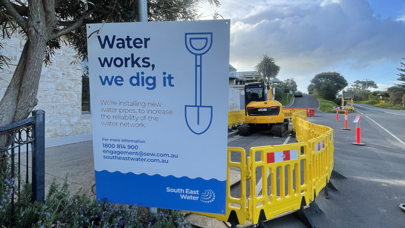 South East Water sign next to barriers.