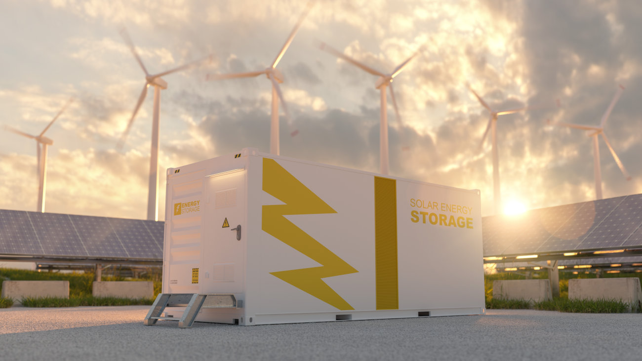 Solar energy storage unit in front of wind turbines.
