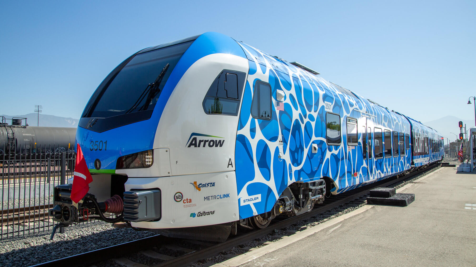ZEMU train at a platform.