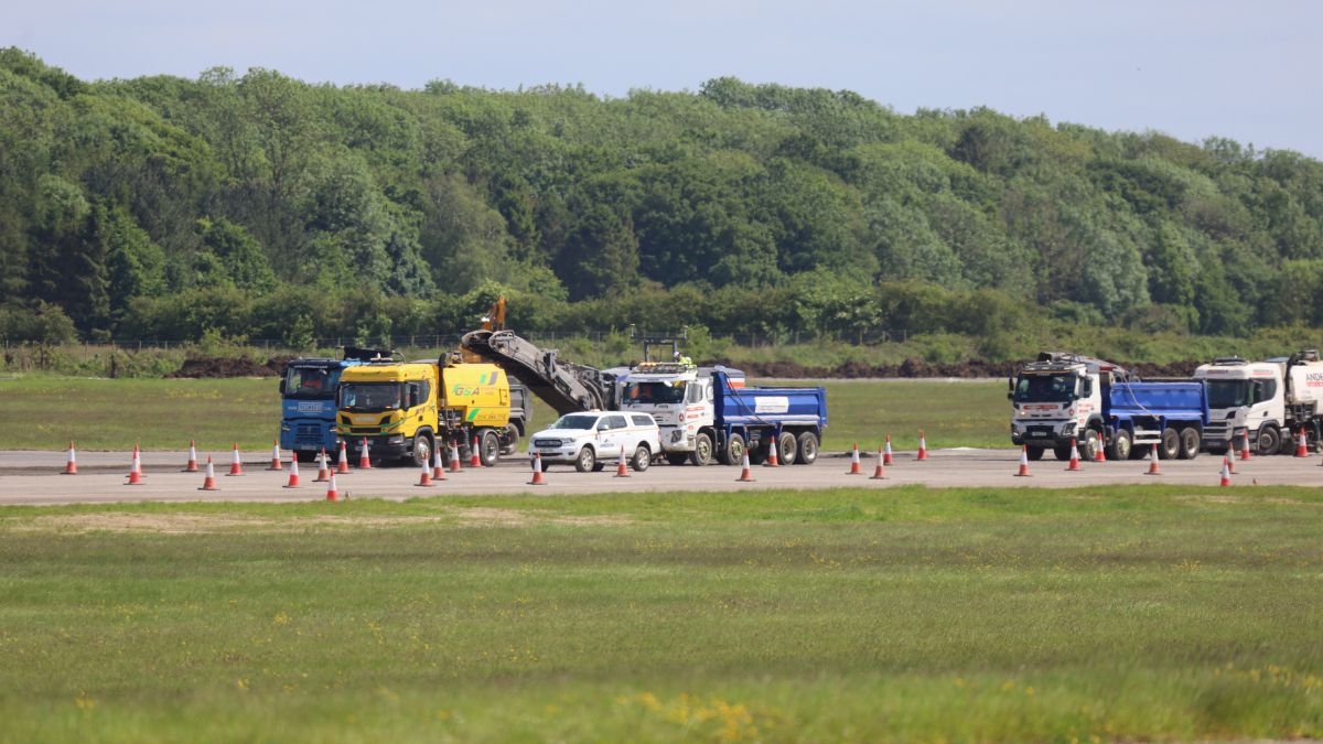Construction vehicles and personnel working on the RAF Leeming runway as part of the &pound;59M resurfacing and refurbishment project.
