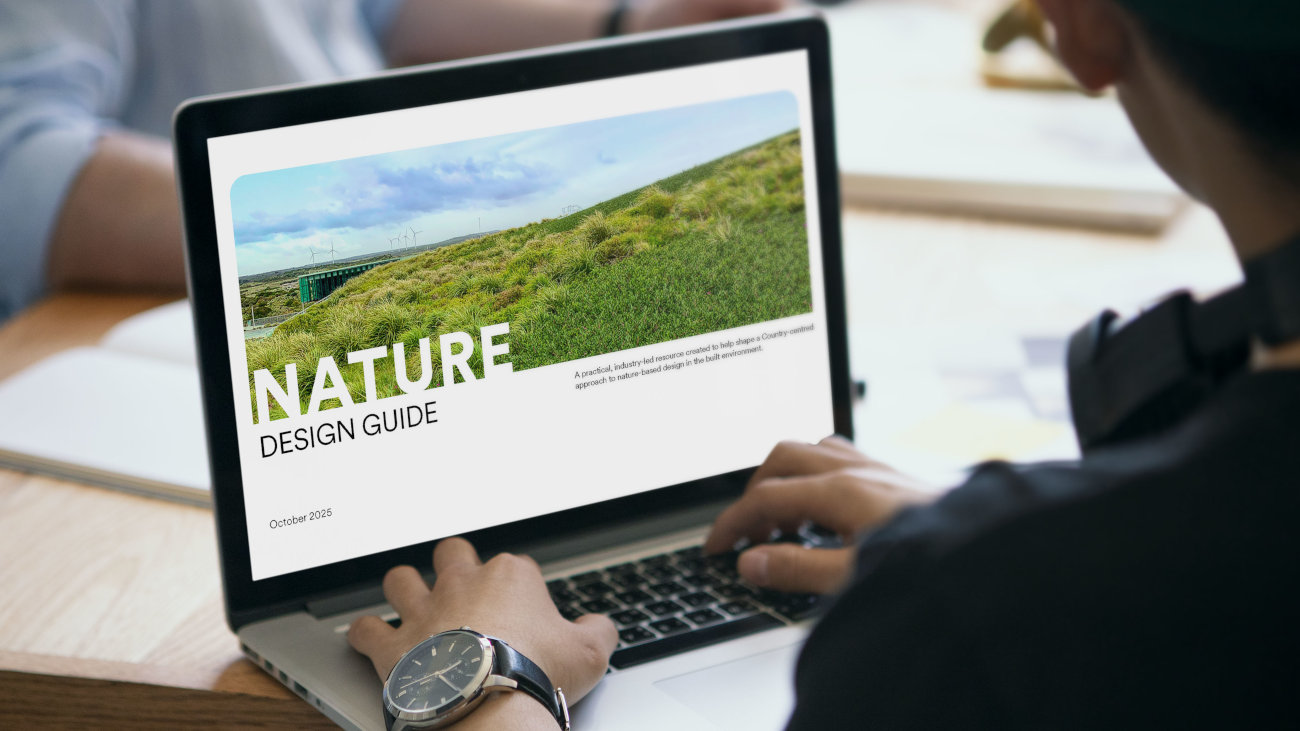 The Nature Design Guide on a laptop.