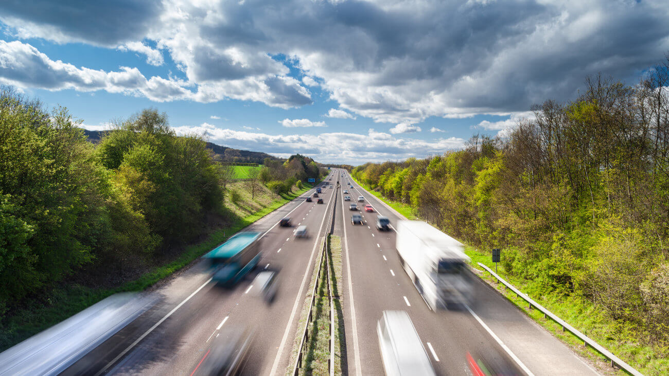 Cars driving along a motorway.