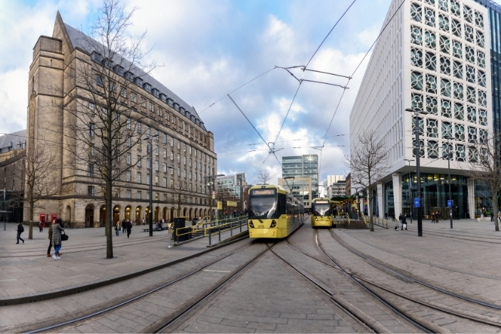 Manchester's Metrolink tram system has been developed to encourage easier and faster travel in the city centre and beyond.